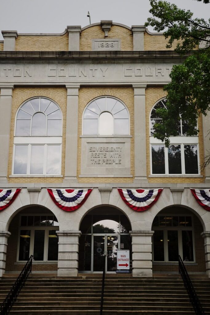 a building with flags on the front
